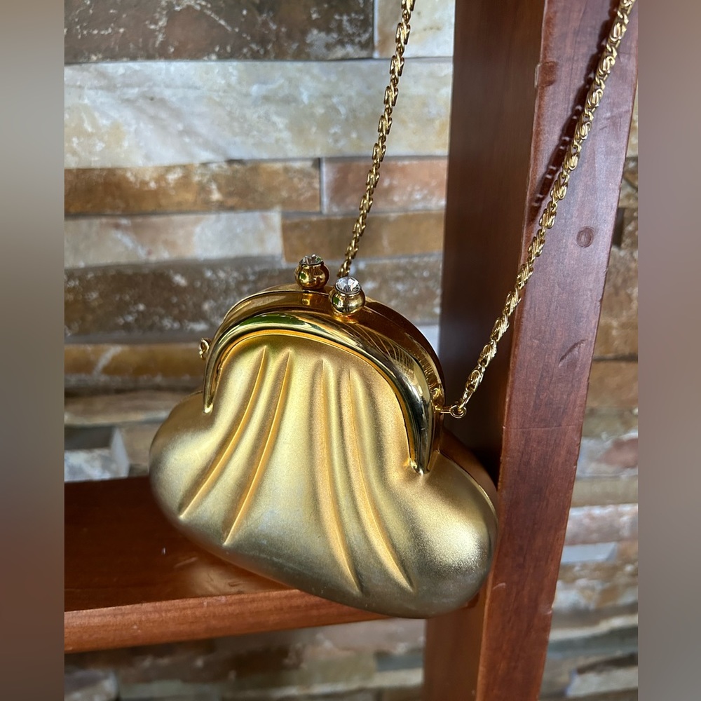 Gold colored metal clutch with chain